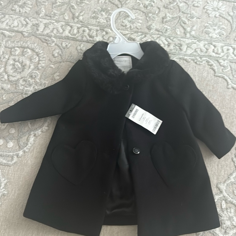 Black wool peacoat with two heart shaped pockets